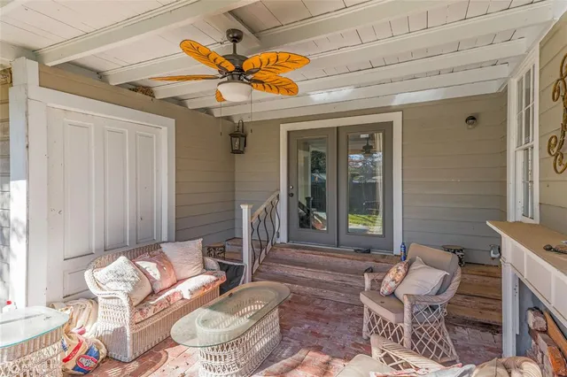 a outdoor space with patio the couches and a dining table with chairs