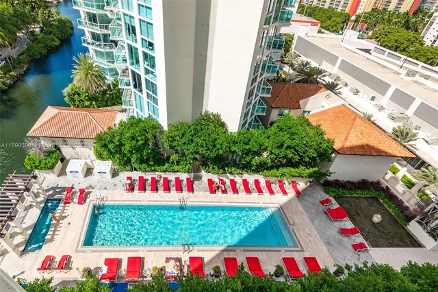 an outdoor space with lots of flowers