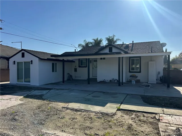 a view of a house with a swimming pool