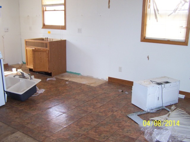 4803 McCullom Lake Road McCullom Lake, IL 60050 - Photo 7 of 7 a living room with hard wood flooring and a couch