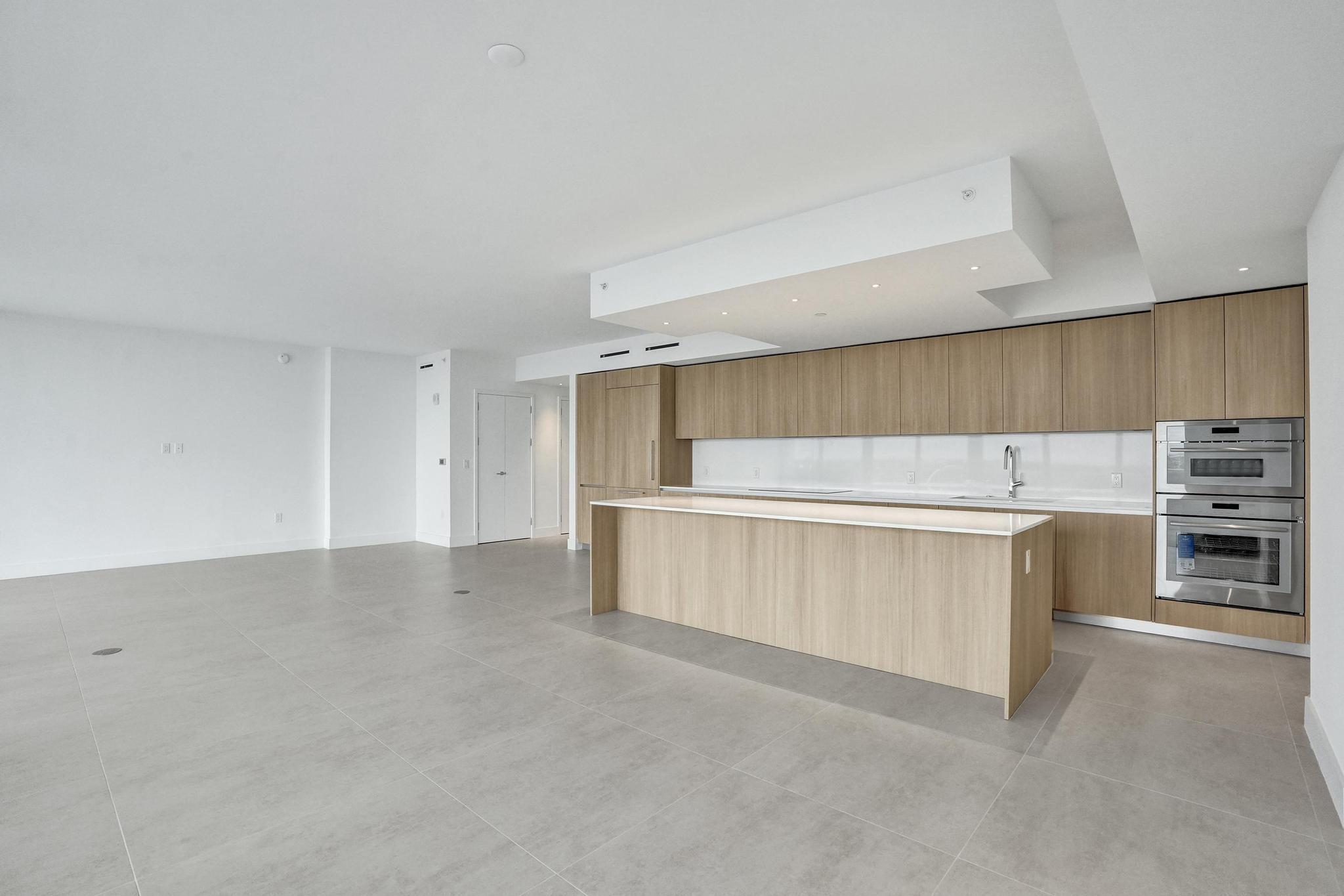 407 North Riverside Drive, Unit 602 Pompano Beach, FL 33062 - Photo 14 of 83 a view of kitchen with cabinets and oven
