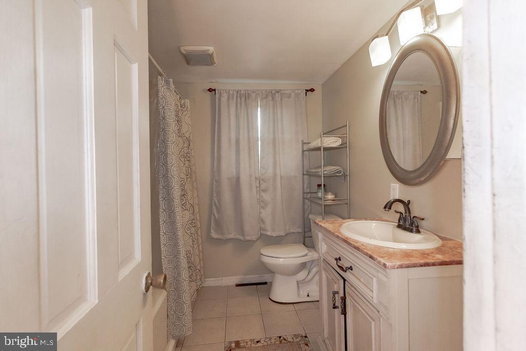 141 Unexpected Road Newfield, NJ 08344 - Photo 8 of 18 Updated bathroom