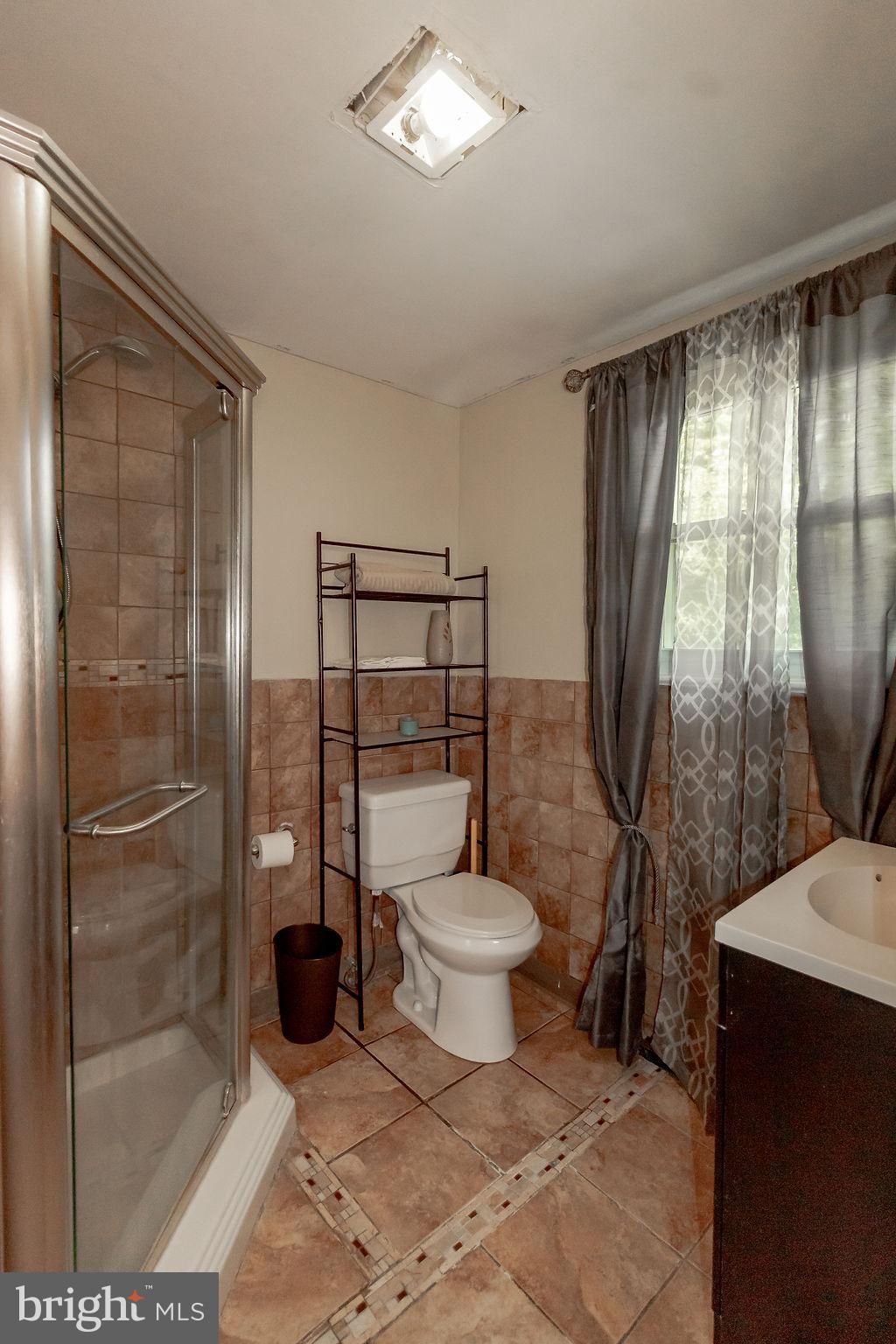 141 Unexpected Road Newfield, NJ 08344 - Photo 10 of 18 Updated bathroom