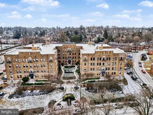 a large building with a city view