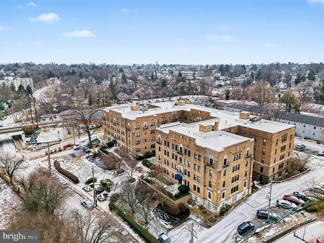 a large building with a city view