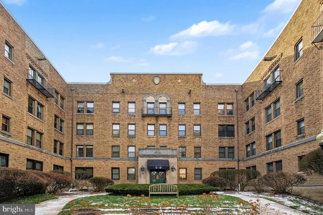 a view of a building with a street