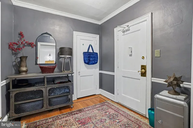 a view of a hallway with workspace and toys