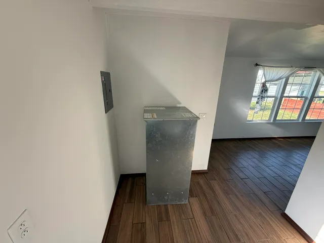 a backyard of a house with wooden fence