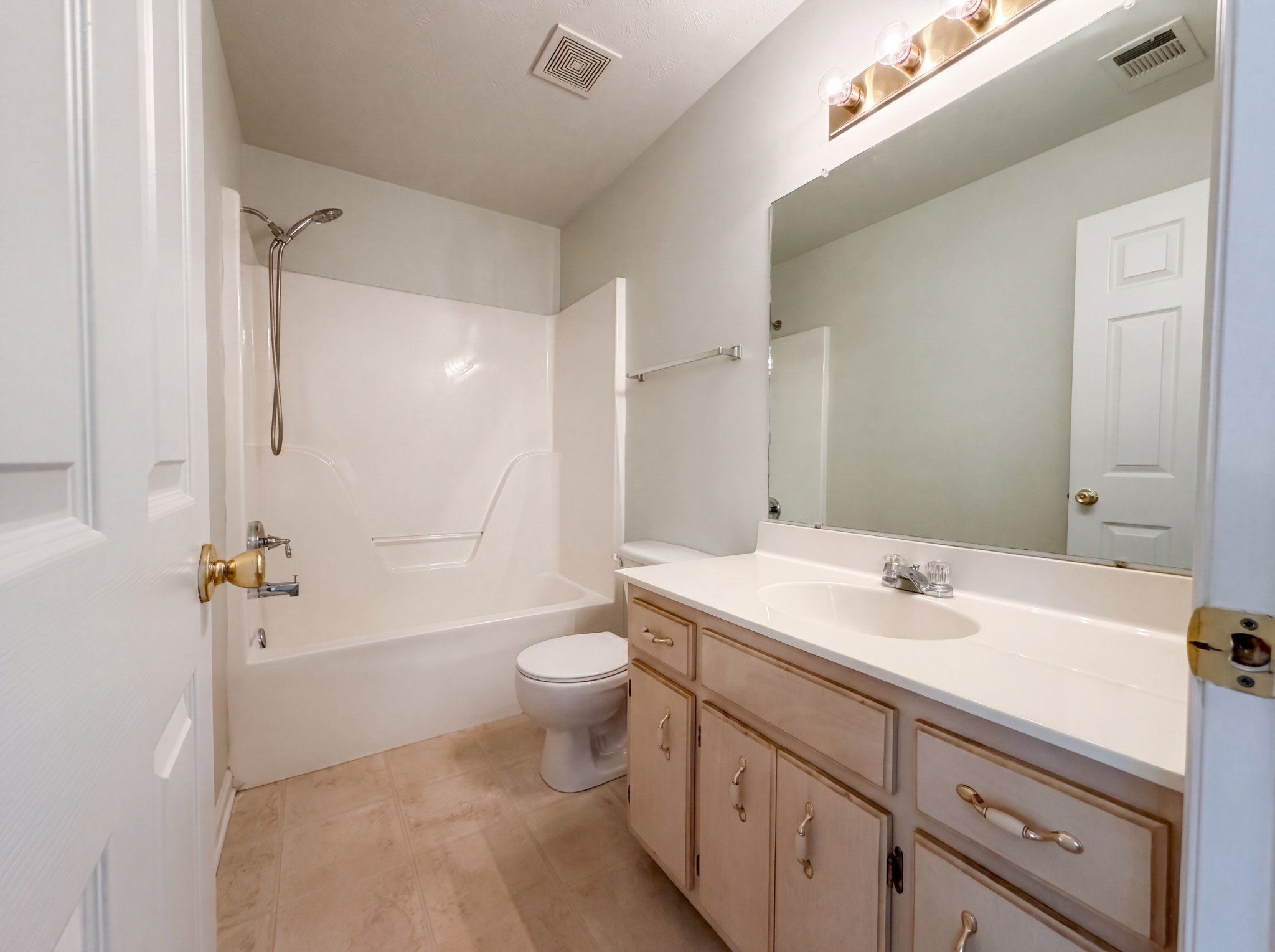 609 Sandy Spring Trail Madison, TN 37115 - Photo 12 of 16 a bathroom with a sink a toilet and shower