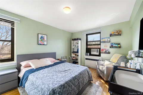 a bedroom with a bed and furniture