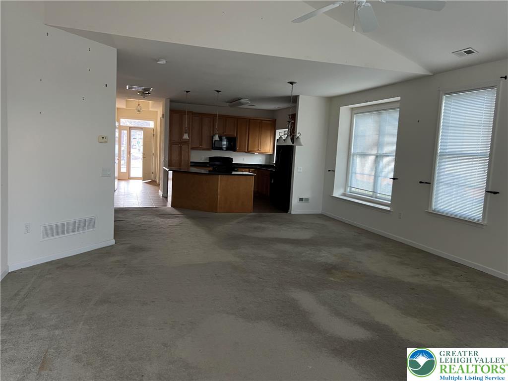 6960 Constitution Drive Bethlehem, PA 18017 - Photo 16 of 18 a view of kitchen with microwave and cabinets