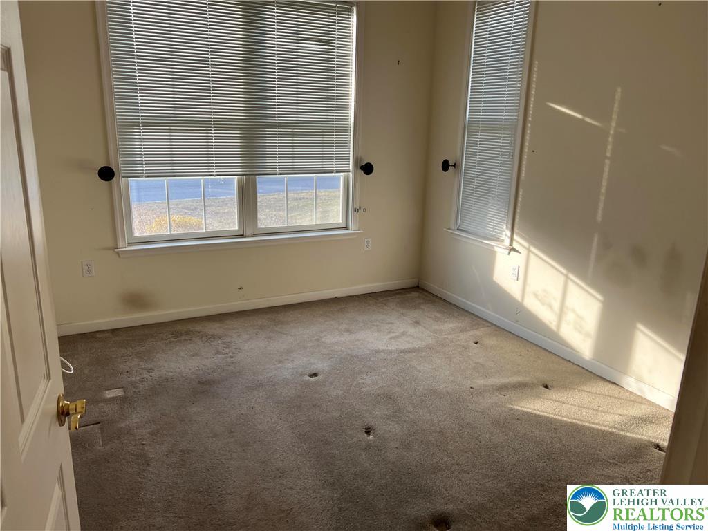 6960 Constitution Drive Bethlehem, PA 18017 - Photo 5 of 18 a view of an empty room with a window
