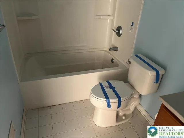 a bathroom with a bathtub