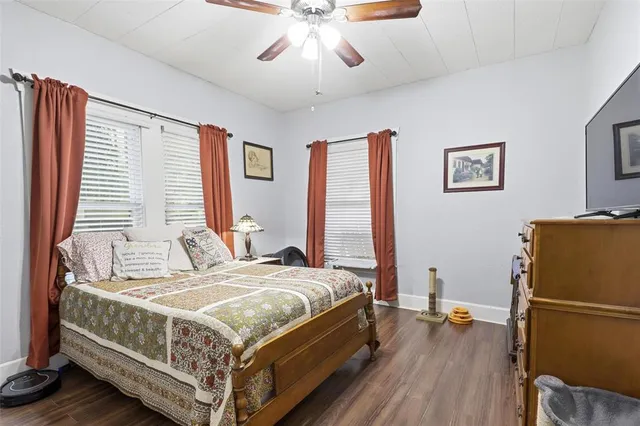 a bedroom with a bed and a table