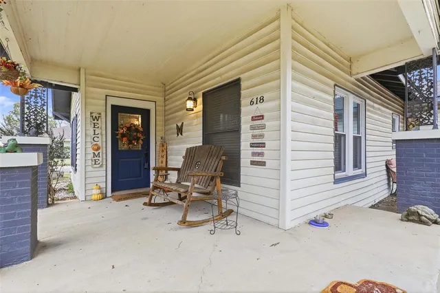 a view of two chairs in the room