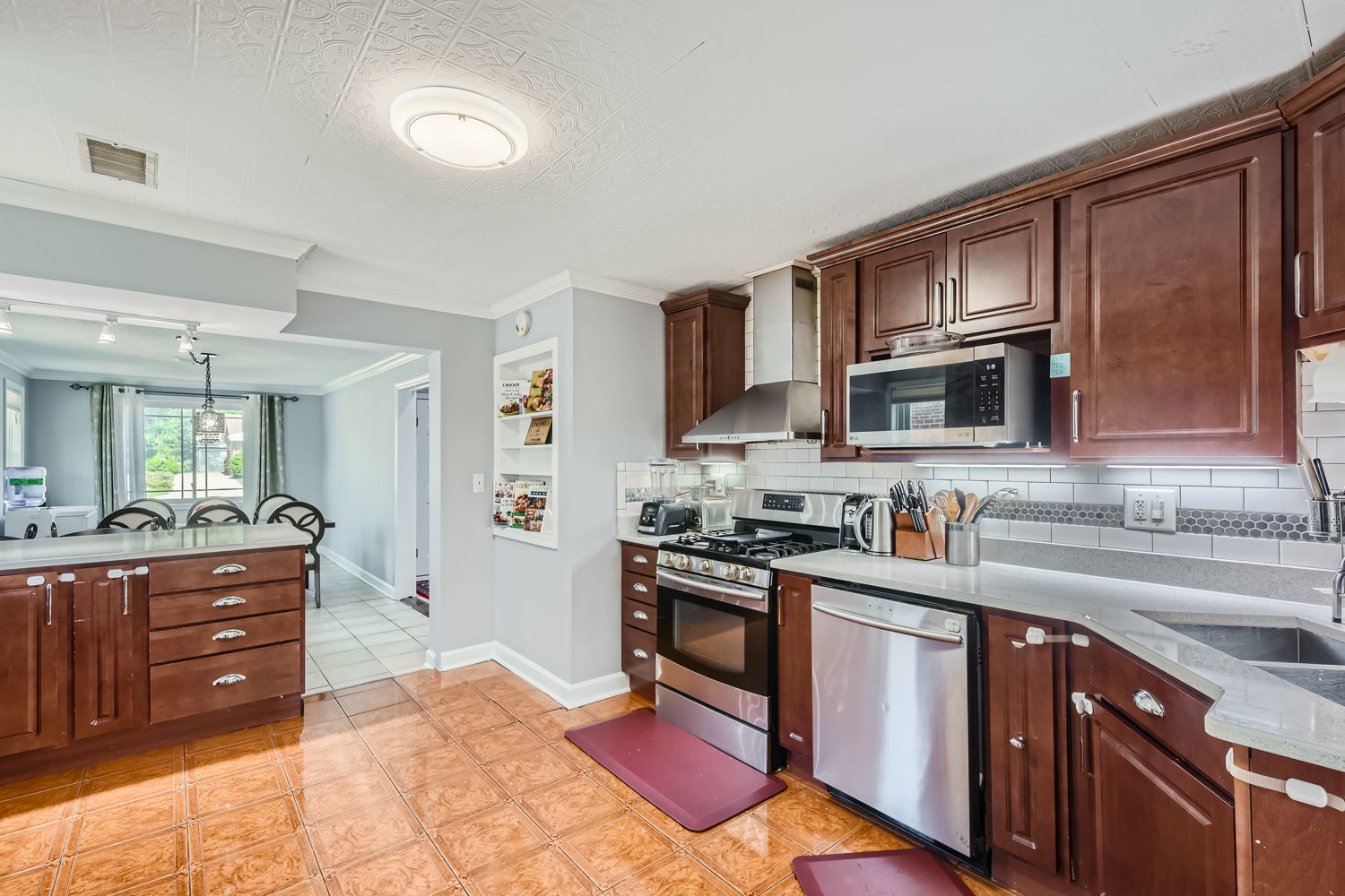 836 Spring Road Elmhurst, IL 60126 - Photo 11 of 31 a kitchen with a sink stove and microwave