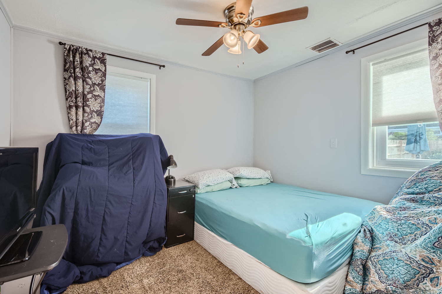836 Spring Road Elmhurst, IL 60126 - Photo 15 of 31 a bedroom with a bed and window
