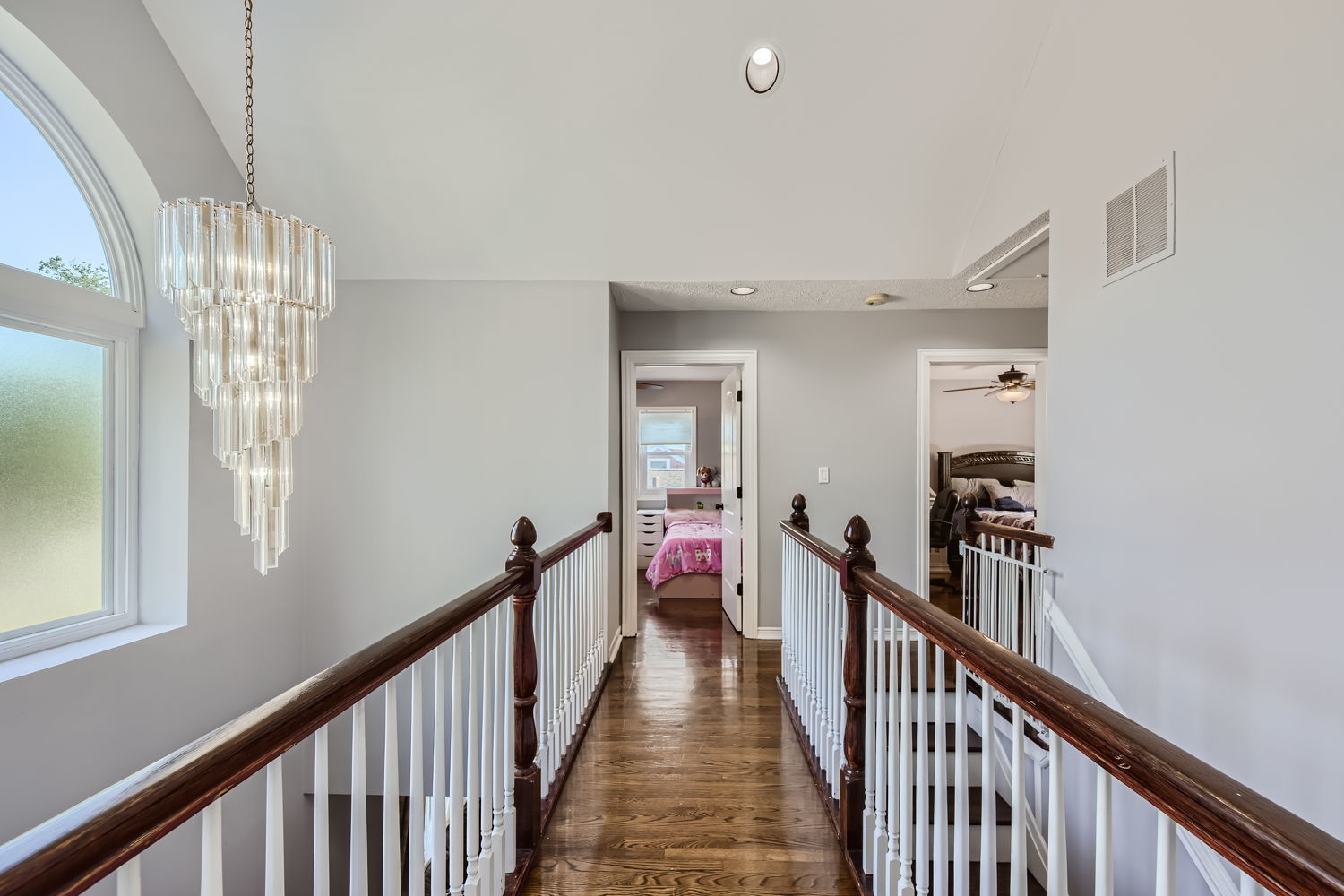 836 Spring Road Elmhurst, IL 60126 - Photo 17 of 31 a view of a hallway with wooden floor and staircase