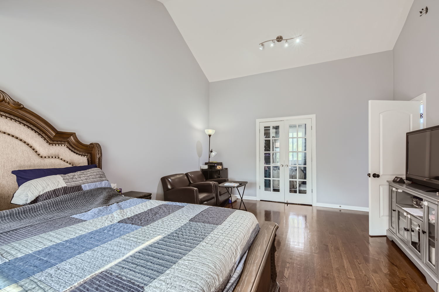 836 Spring Road Elmhurst, IL 60126 - Photo 22 of 31 a bedroom with a bed and a flat screen tv