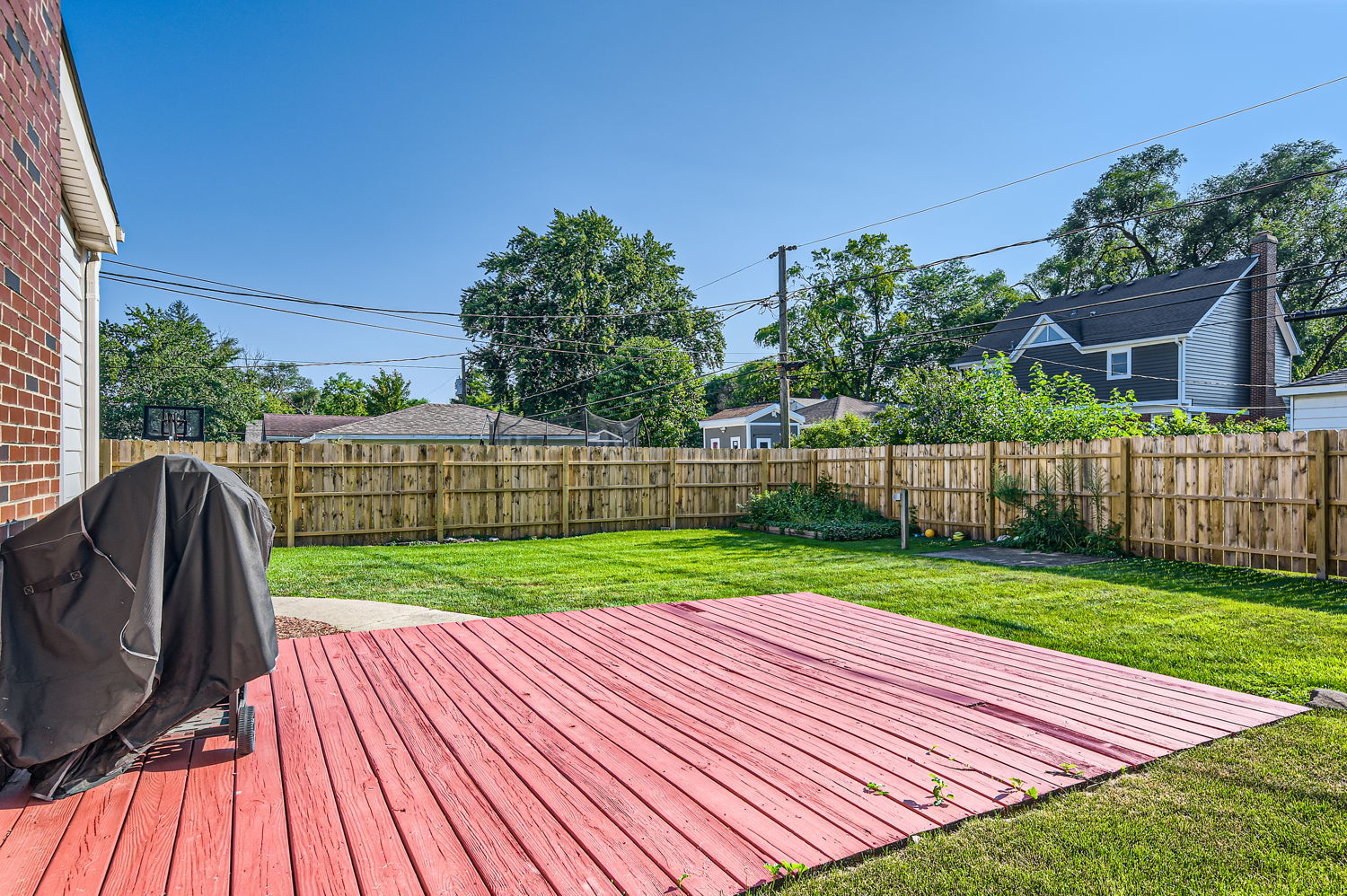 836 Spring Road Elmhurst, IL 60126 - Photo 27 of 31 a view of a backyard with wooden floor and fence
