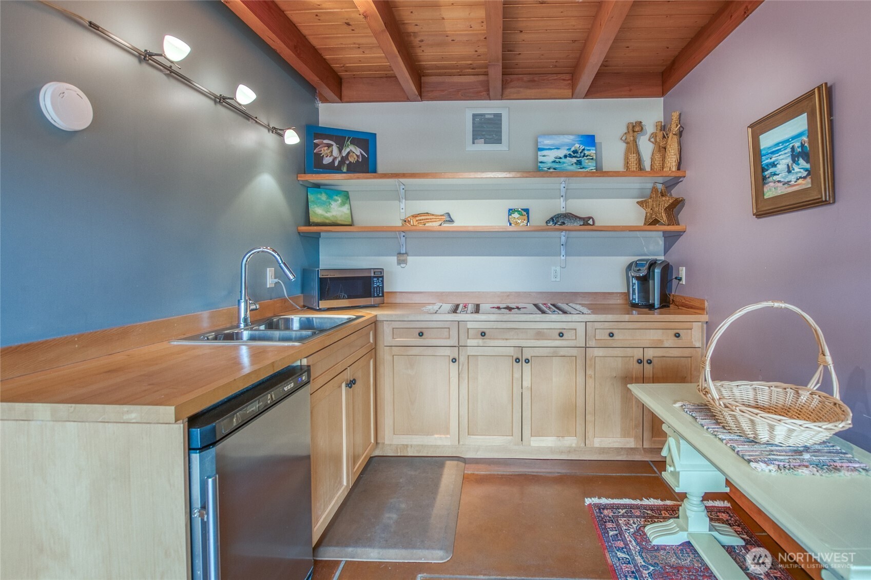 402 Cayou Valley Road Orcas Island, WA 98245 - Photo 33 of 40 a kitchen with a stove a sink and a refrigerator