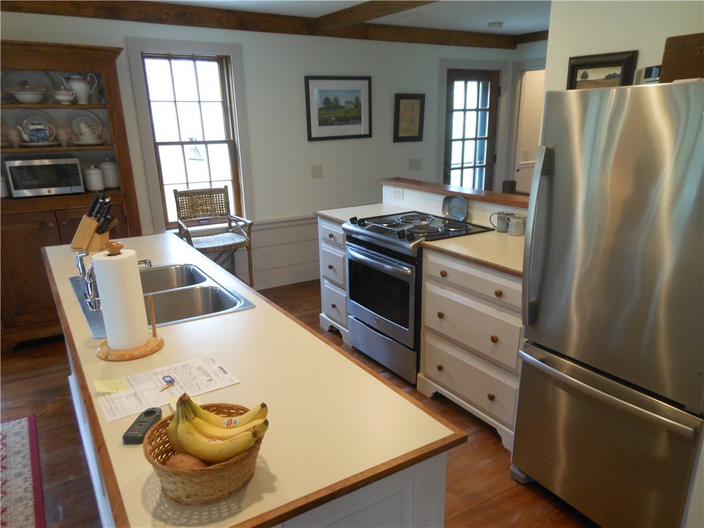 20 Potter Road Foster, RI 02825 - Photo 13 of 29 CUSTOM KITCHEN WITH DINING AREA