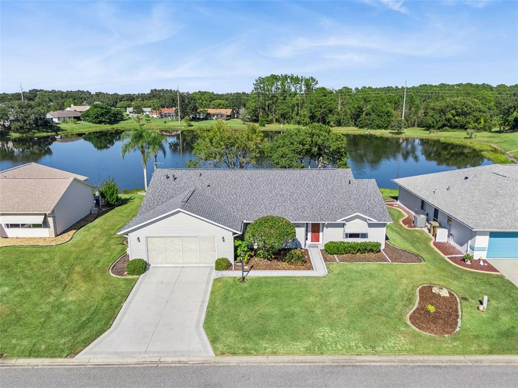 an aerial view of a house with garden