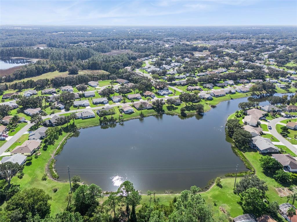26450 Evert Street Leesburg, FL 34748 - Photo 49 of 93 an aerial view of a house with a lake view