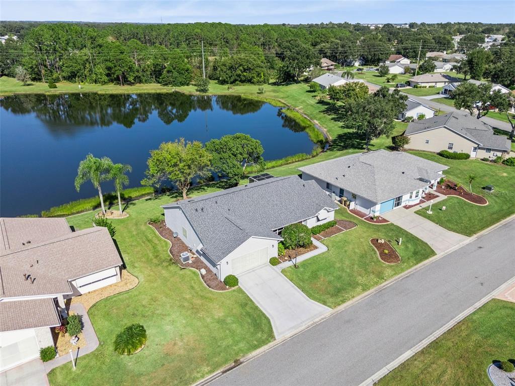 26450 Evert Street Leesburg, FL 34748 - Photo 7 of 93 an aerial view of a house with outdoor space and lake view
