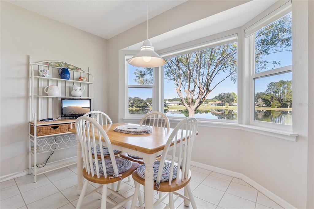 26450 Evert Street Leesburg, FL 34748 - Photo 9 of 93 a view of a dining room with furniture window and outside view