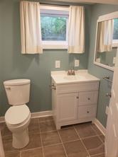 127 Longvue Drive Pittsburgh, PA 15237 - Photo 8 of 15 a bathroom with a toilet sink and mirror
