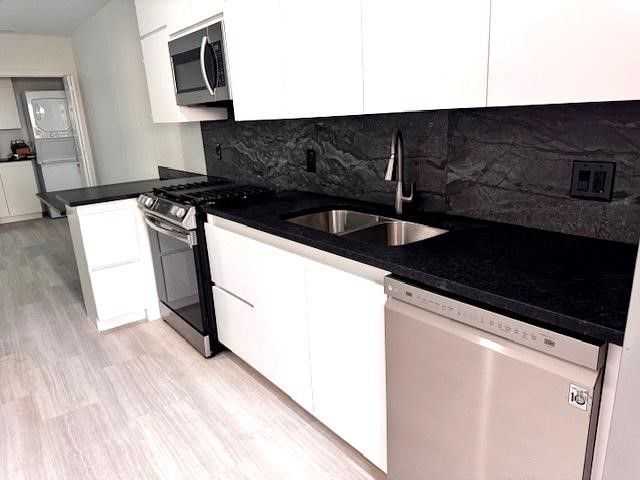 2901 Isabella Street Houston, TX 77004 - Photo 2 of 8 a kitchen with a sink and cabinets