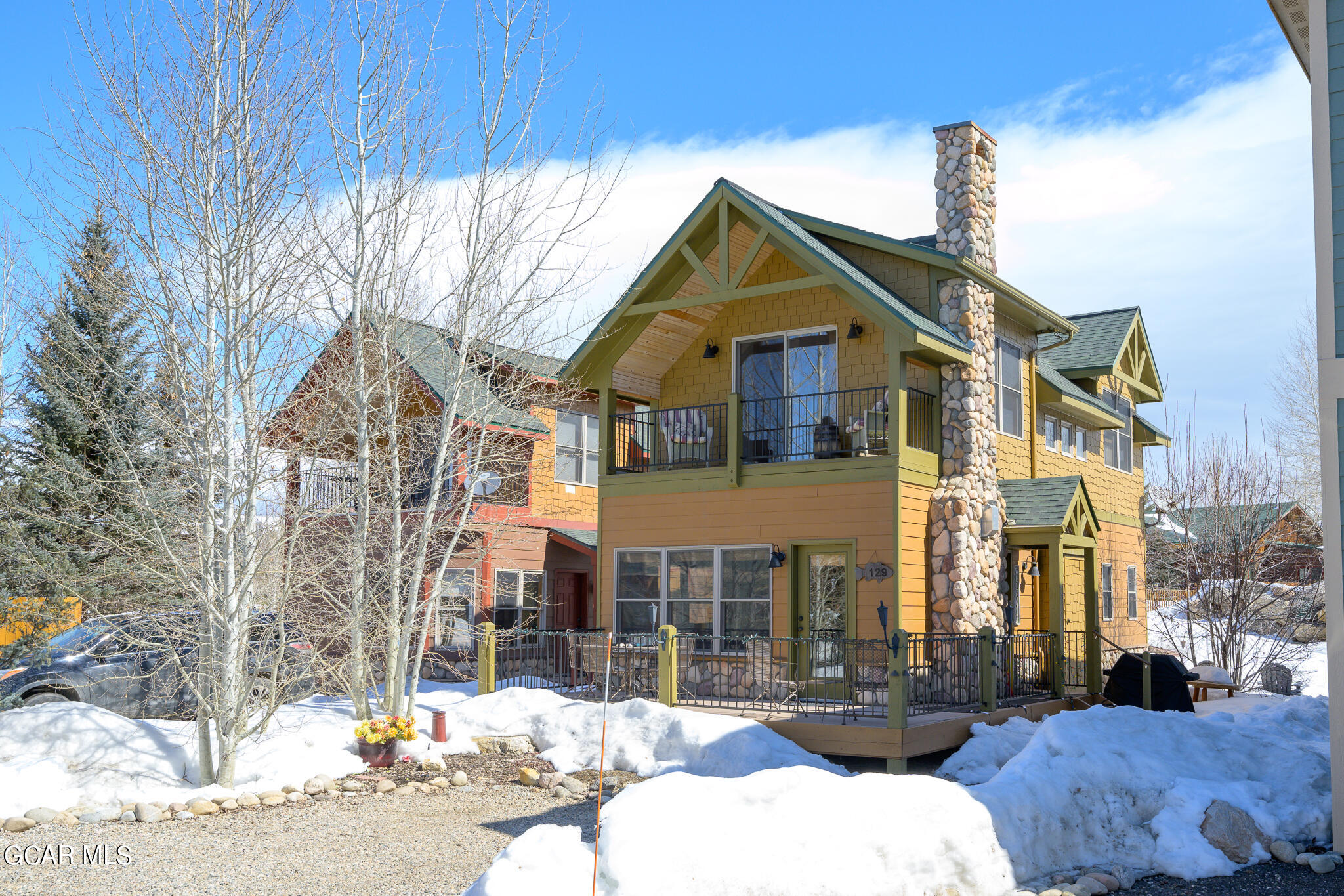 129 Edgewater Circle Granby, CO 80446 - Photo 1 of 63 a front view of a house with a yard