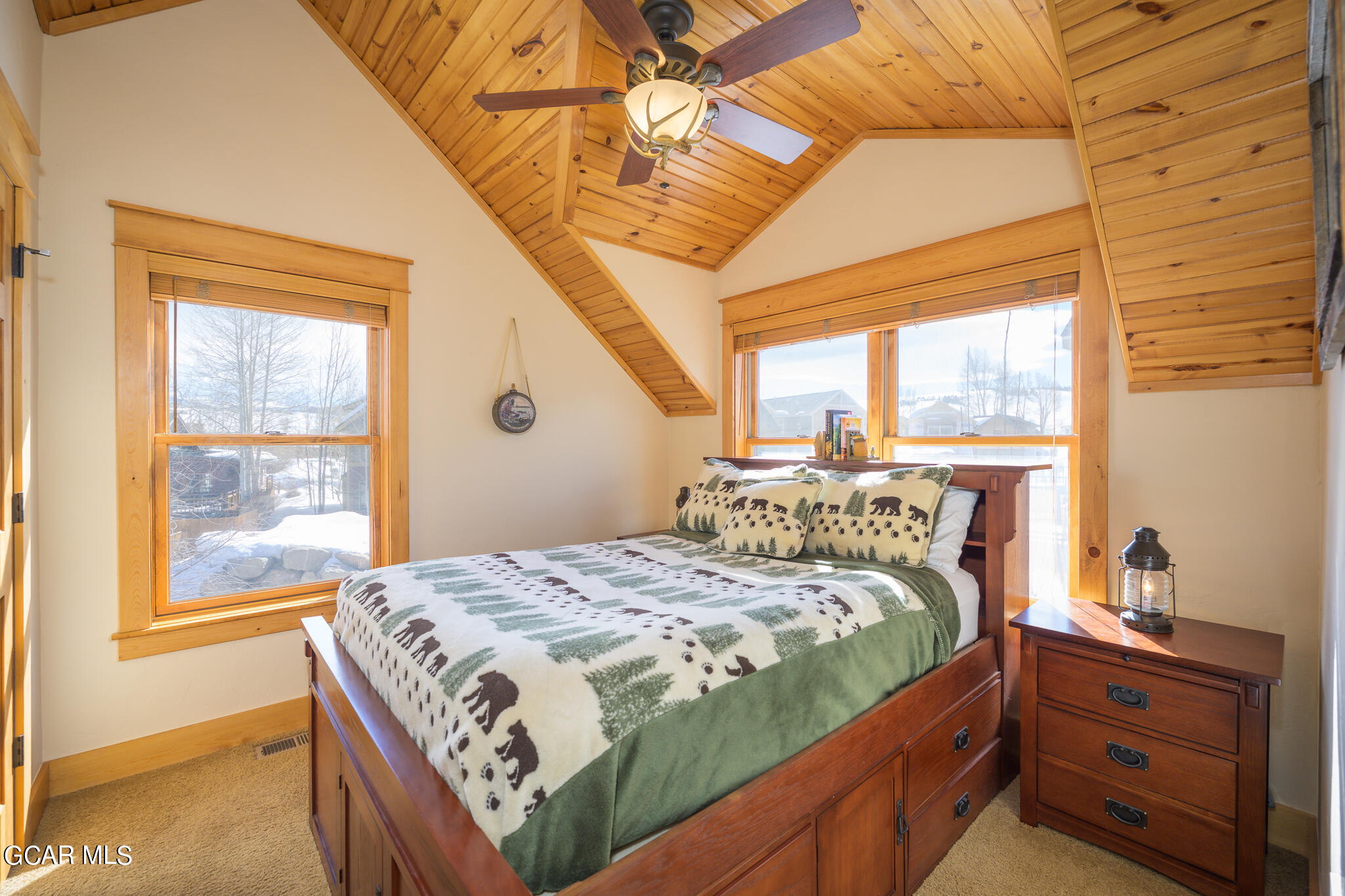 129 Edgewater Circle Granby, CO 80446 - Photo 14 of 63 a bedroom with a bed and a window