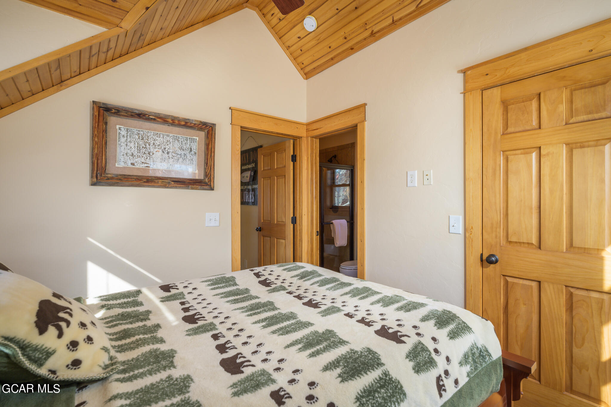 129 Edgewater Circle Granby, CO 80446 - Photo 15 of 63 a bedroom with a bed and a window