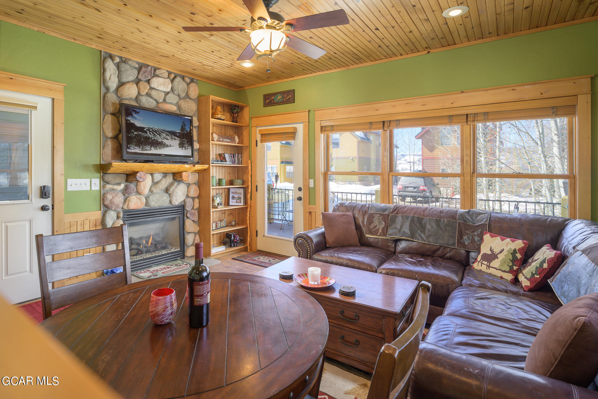 129 Edgewater Circle Granby, CO 80446 - Photo 2 of 63 a living room with furniture and a large window