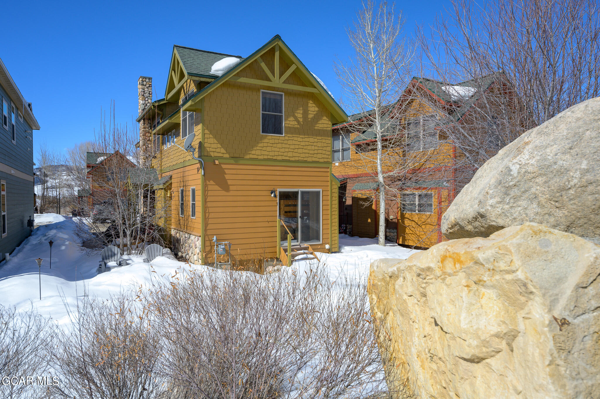 129 Edgewater Circle Granby, CO 80446 - Photo 27 of 63 a front view of a house with a yard