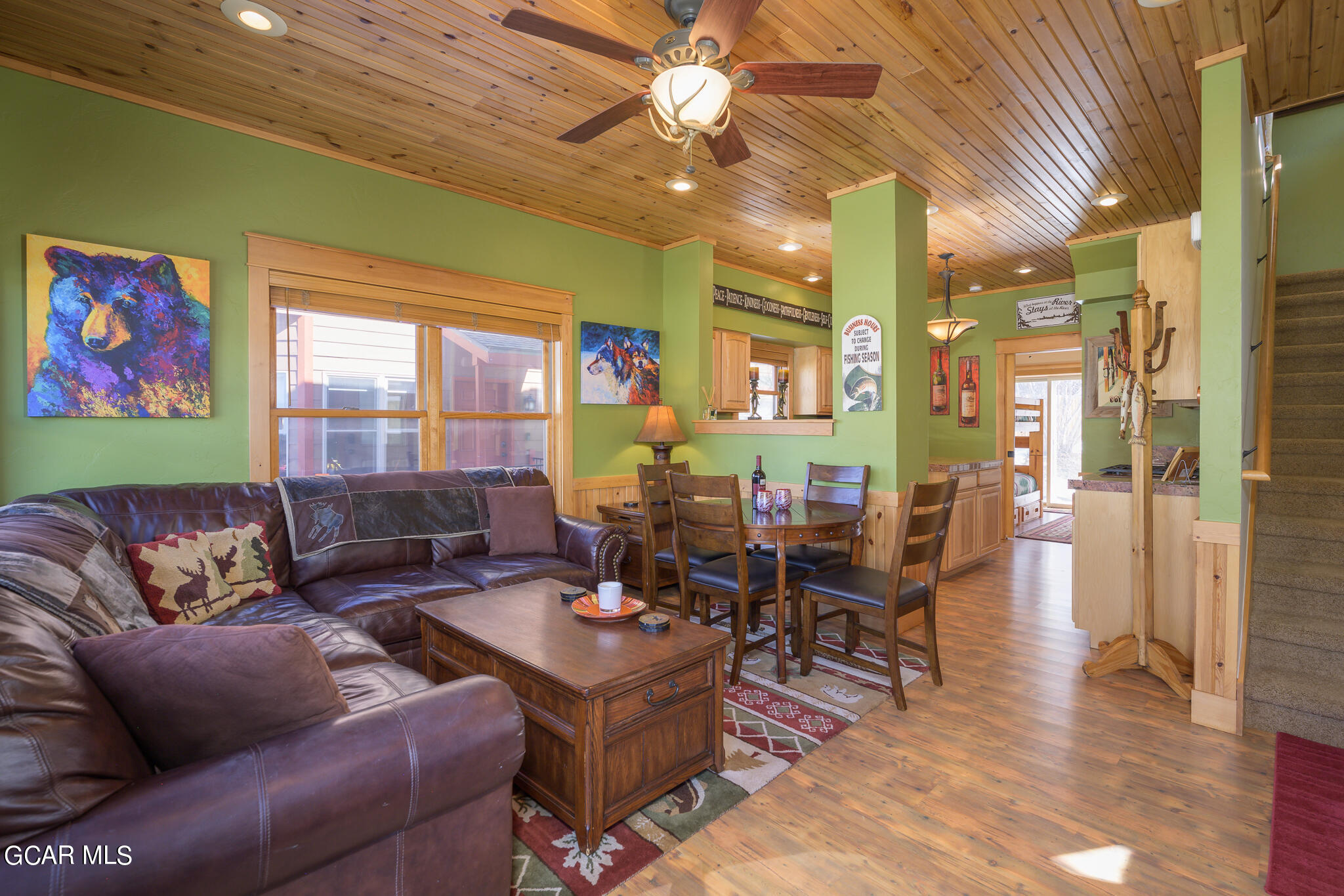 129 Edgewater Circle Granby, CO 80446 - Photo 5 of 63 a living room with furniture and a large window