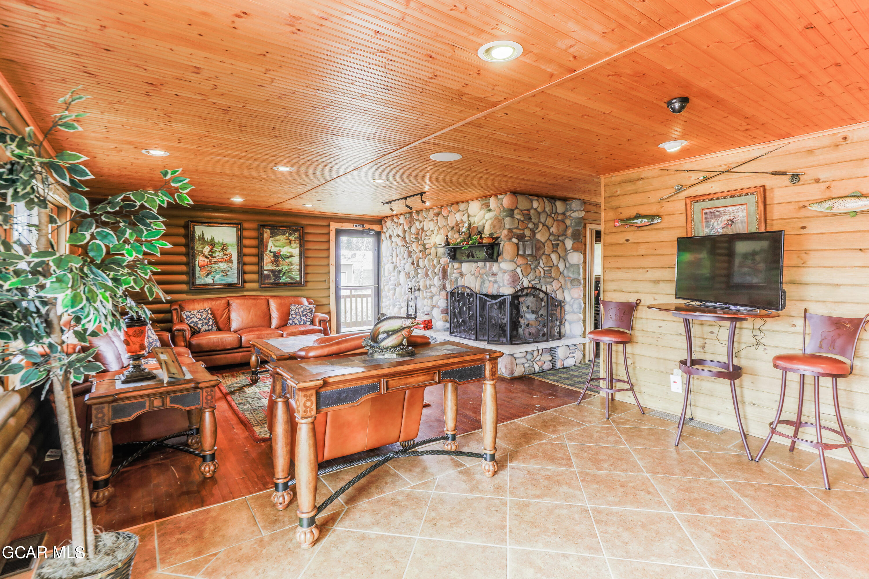 129 Edgewater Circle Granby, CO 80446 - Photo 58 of 63 a view of a chairs and table in a patio