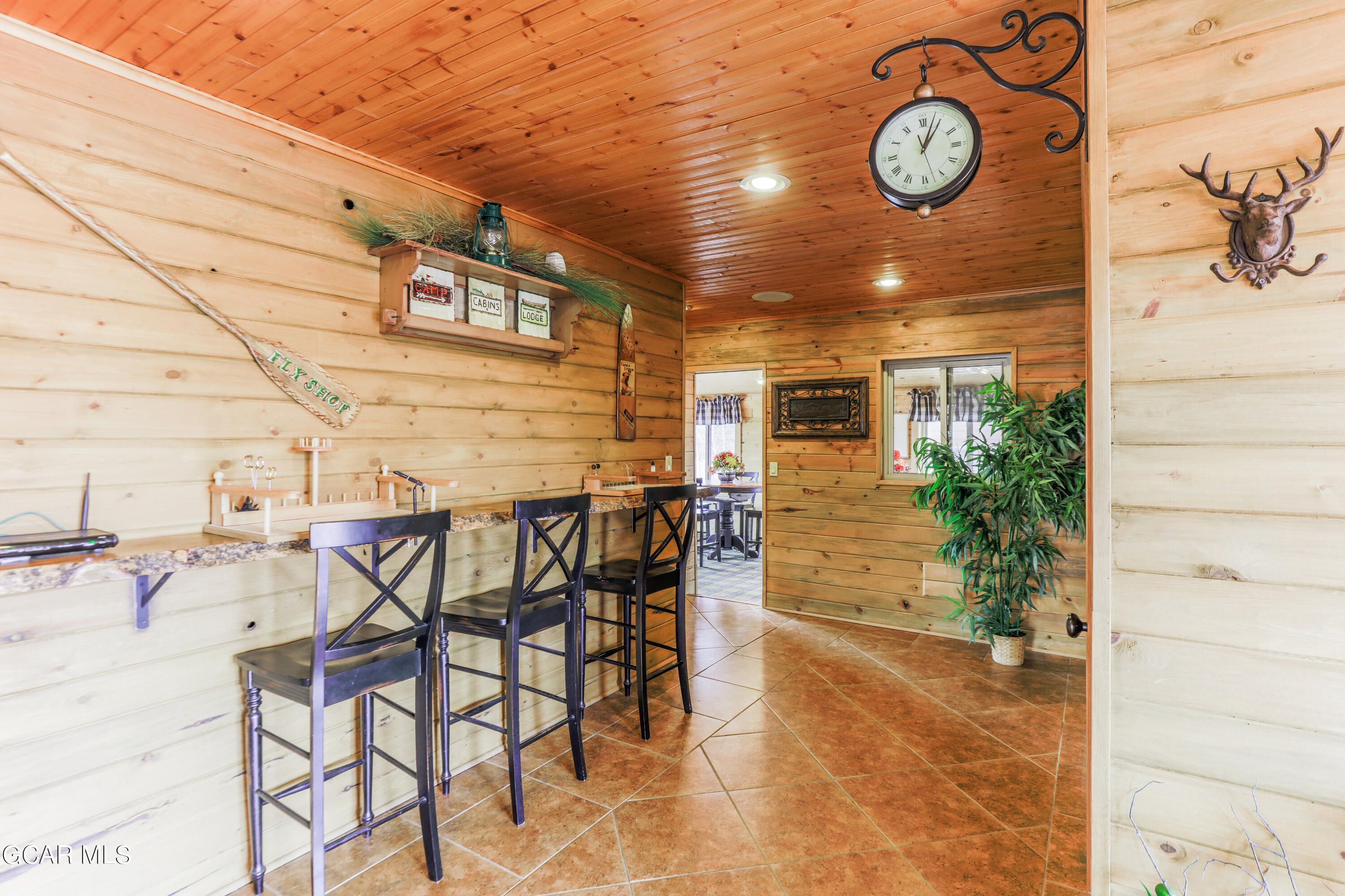 129 Edgewater Circle Granby, CO 80446 - Photo 59 of 63 a view of a chairs and table in the patio