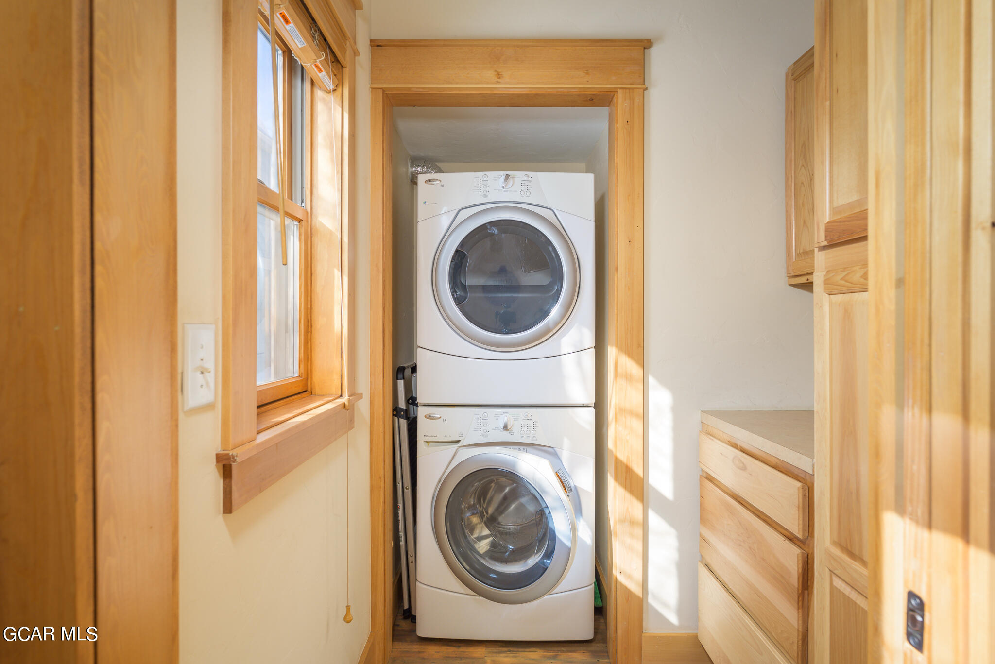 129 Edgewater Circle Granby, CO 80446 - Photo 10 of 63 a utility room with dryer and washer