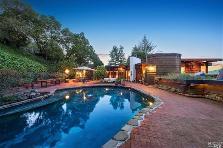 7 Upper Road West Ross, CA 94957 - Photo 1 of 1 a view of a swimming pool with a patio