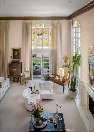 a bathroom with a granite countertop sink a mirror and shower