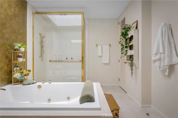 a bed room with a bed and a couch