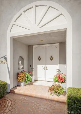 a front view of a house with a garage