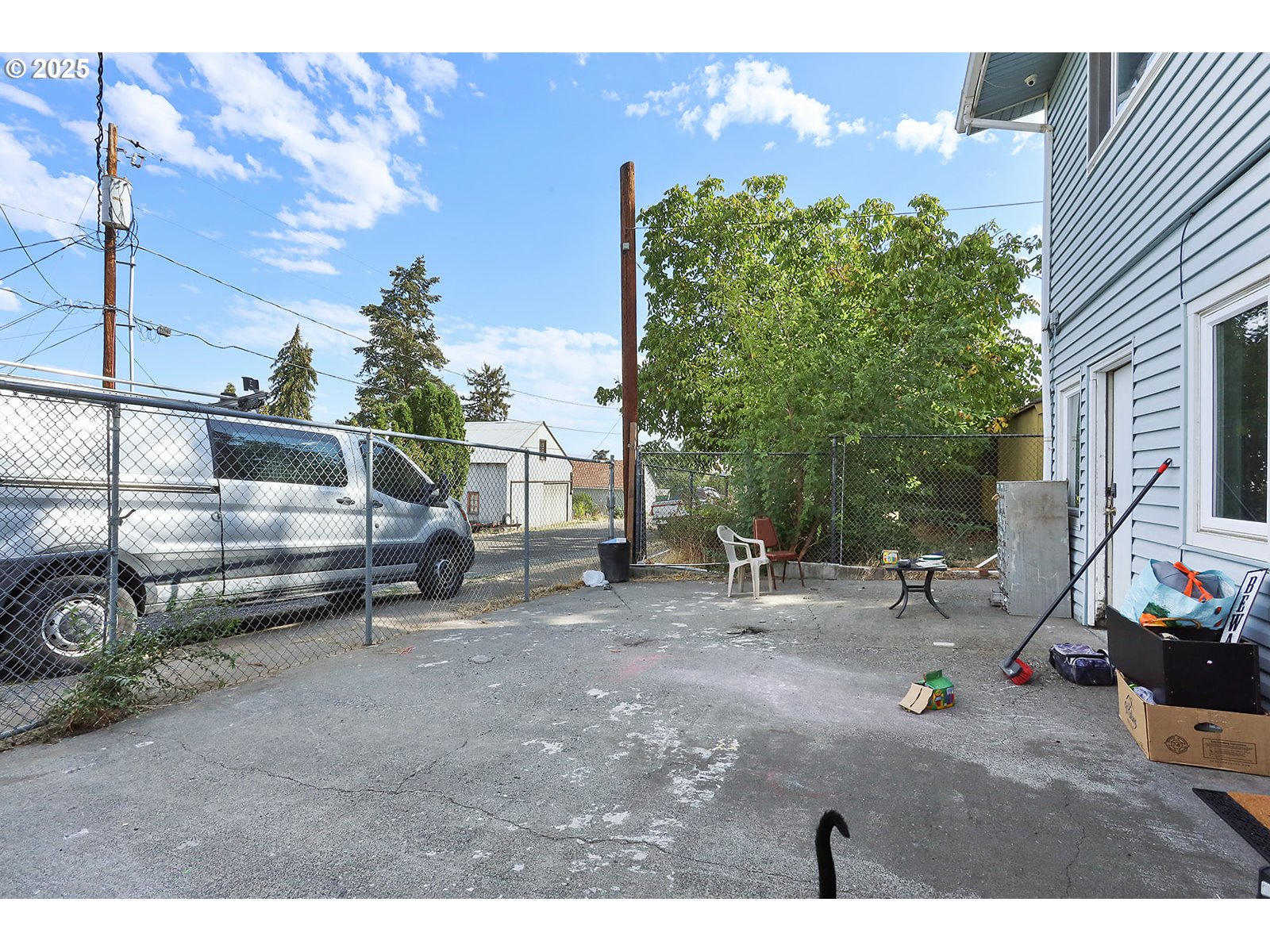 812 East 15th Street The Dalles, OR 97058 - Photo 15 of 41 a view of a backyard with a sitting area