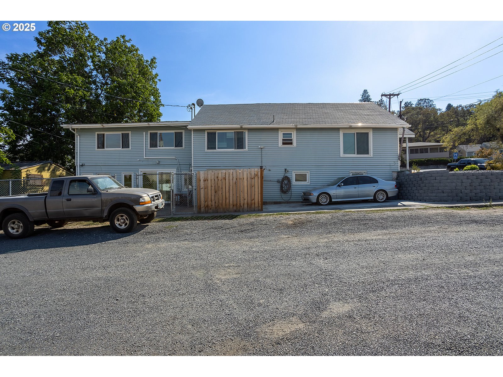 812 East 15th Street The Dalles, OR 97058 - Photo 27 of 41 a view of a car parked in front of a house