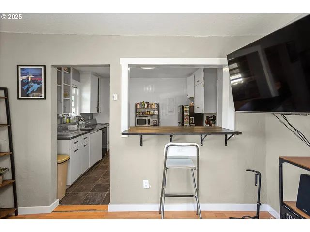 a en suite bathroom with a toilet a sink and mirror