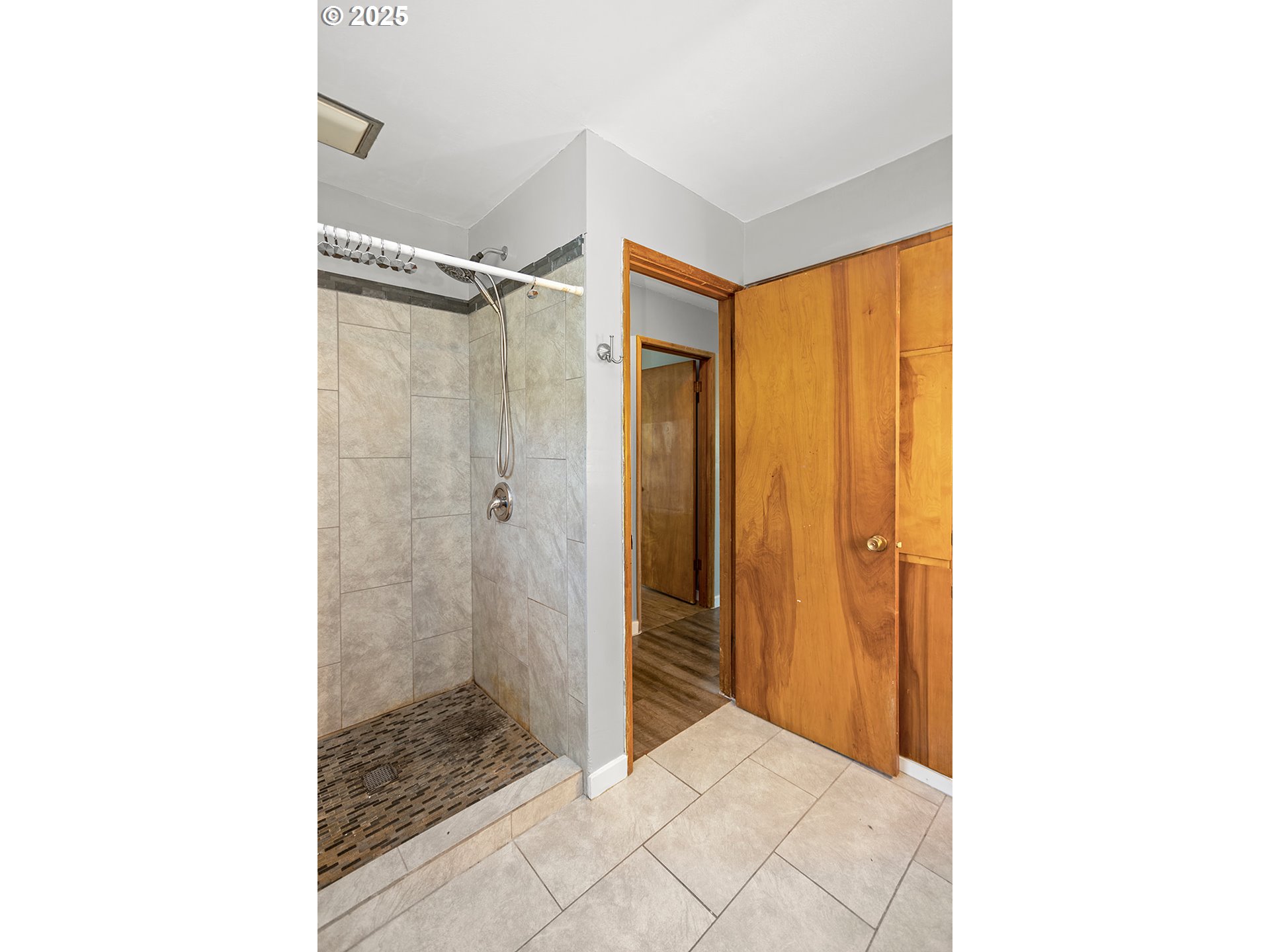 812 East 15th Street The Dalles, OR 97058 - Photo 40 of 41 a bathroom with a shower and a sink