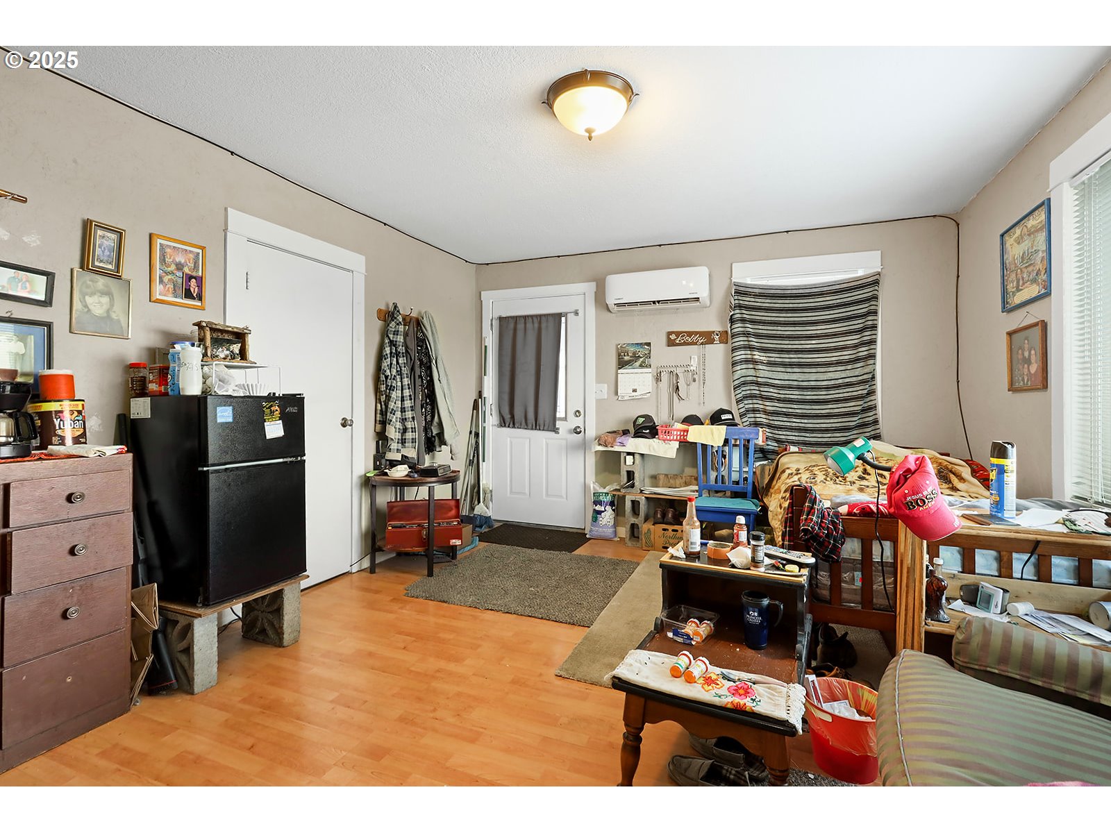 812 East 15th Street The Dalles, OR 97058 - Photo 6 of 41 a living room with furniture a flat screen tv and a dining table
